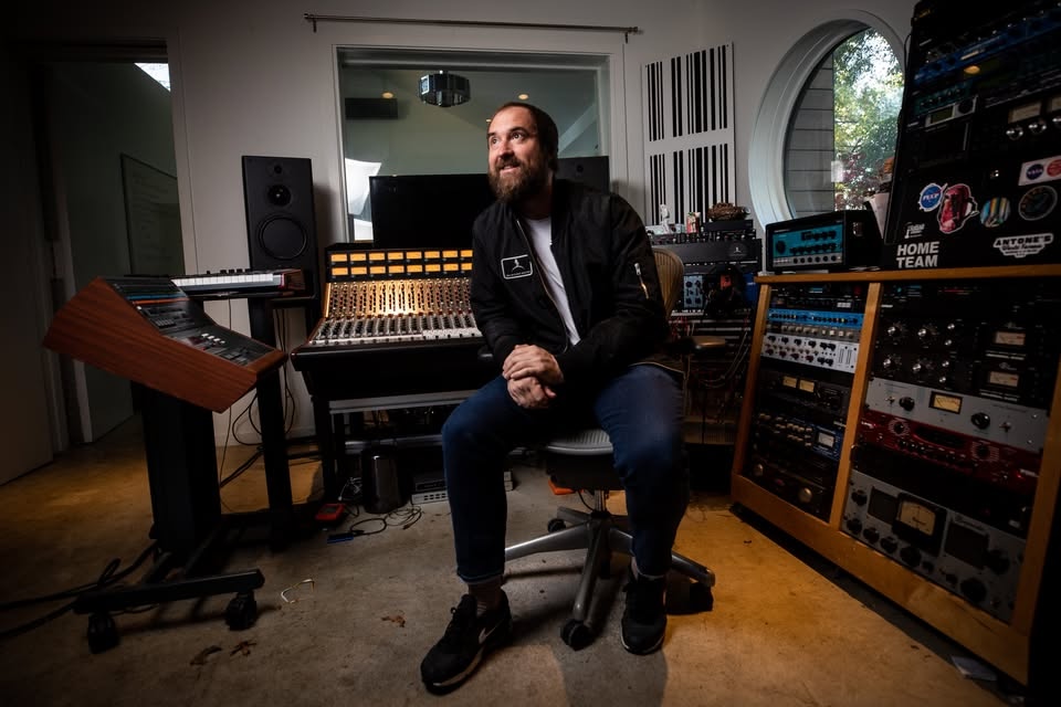 Brett Orrison, founder of Spaceflight Records, is pictured in his recording studio on Dec. 15, 2022, in Austin. (Credit: Michael Minasi / KUT News)